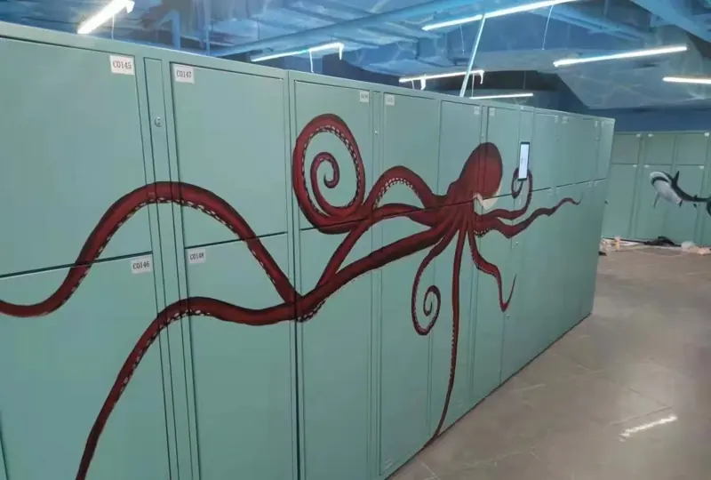 Smart lockers with a decorative mural in a resort locker room